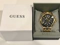  Shop Authentic Guess Surge Chronograph Black Dial Gold Steel Strap Watch for Men - W1258G2 - Luxxuri
