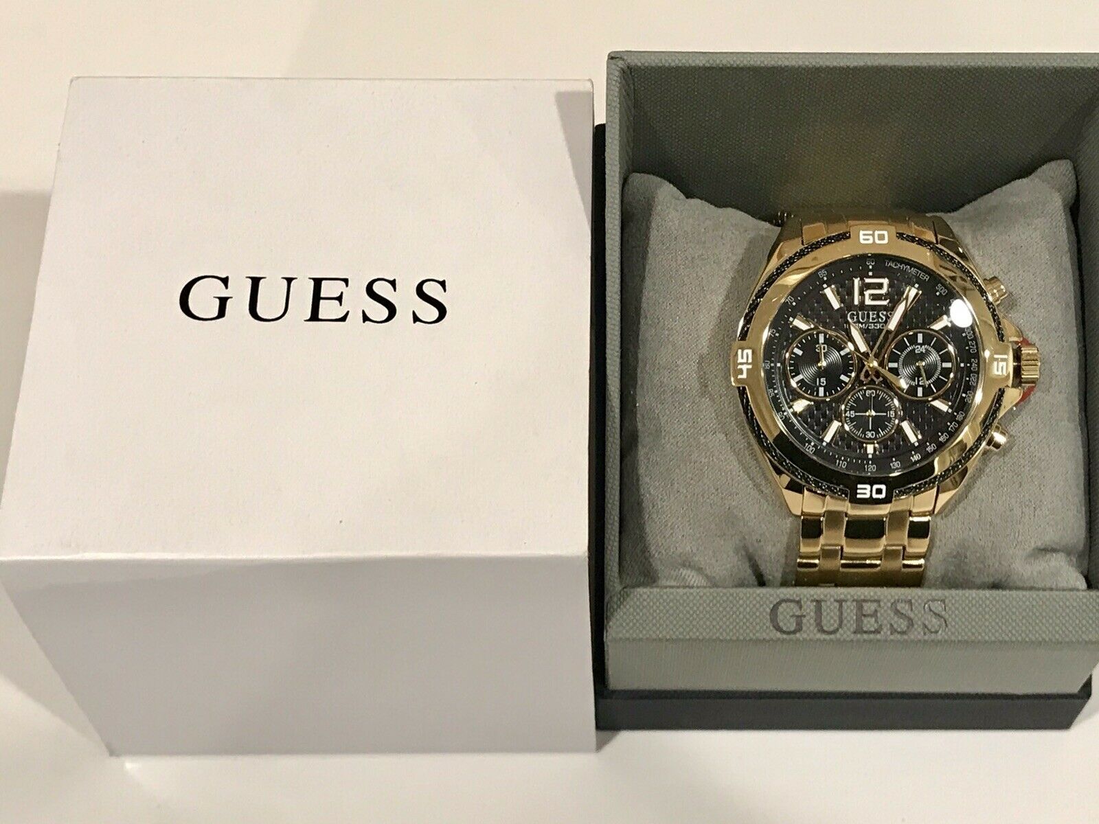  Shop Authentic Guess Surge Chronograph Black Dial Gold Steel Strap Watch for Men - W1258G2 - Luxxuri