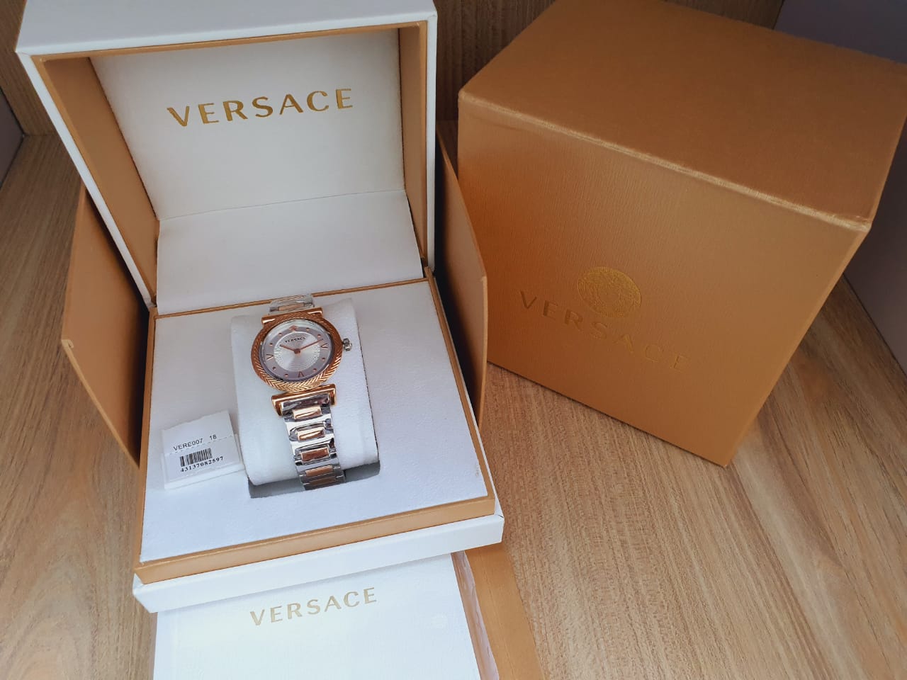  Shop Authentic Versace V-Motif Silver Dial Two Tone Steel Strap Watch for Women - VERE00718 - Luxxuri