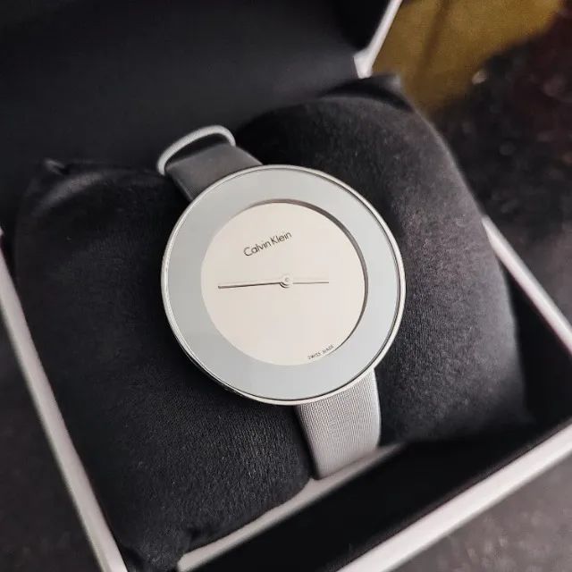  Shop Authentic Calvin Klein Chic Silver Dial White Leather Strap Watch for Women - K7N23UP8 - Luxxuri