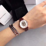  Shop Authentic Emporio Armani Meccanico Skeleton Mother of Pearl Dial Brown Leather Strap Watch For Women - AR1993 - Luxxuri