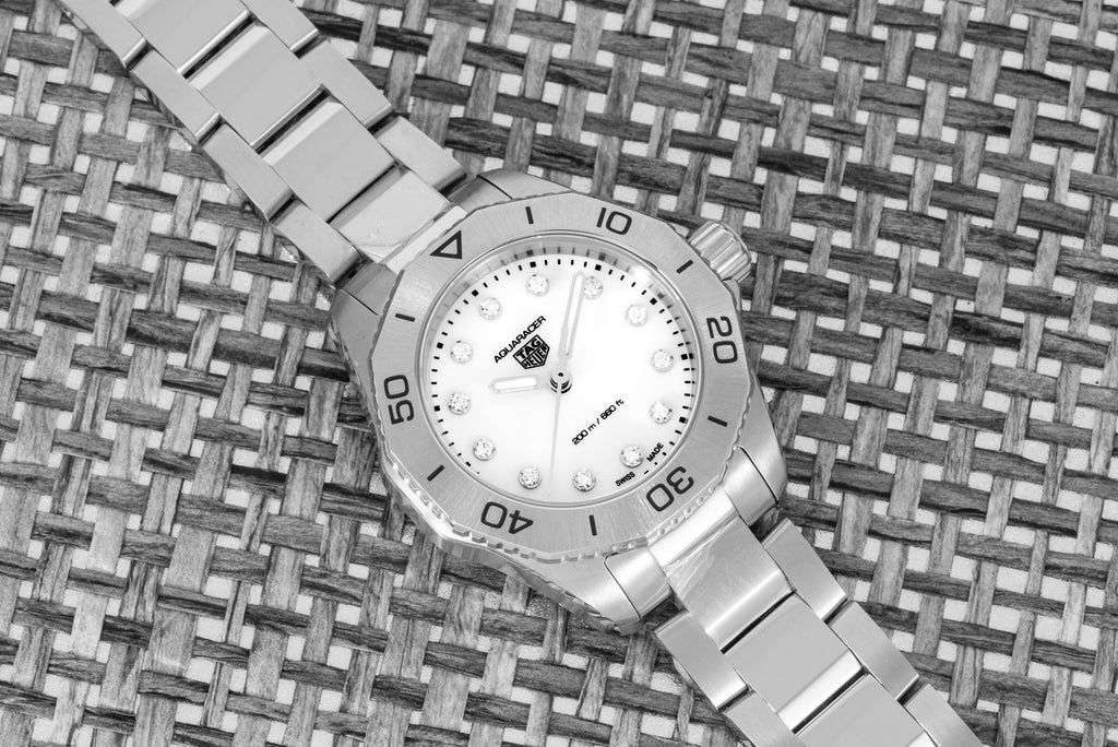  Shop Authentic Tag Heuer Aquaracer Professional 200 Quartz Diamond Mother of Pearl Dial Silver Steel Strap Watch for Women - WBP1416.BA0622 - Luxxuri