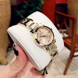  Shop Authentic Burberry The City Gold Dial Gold Steel Strap Watch for Women - BU9234 - Luxxuri