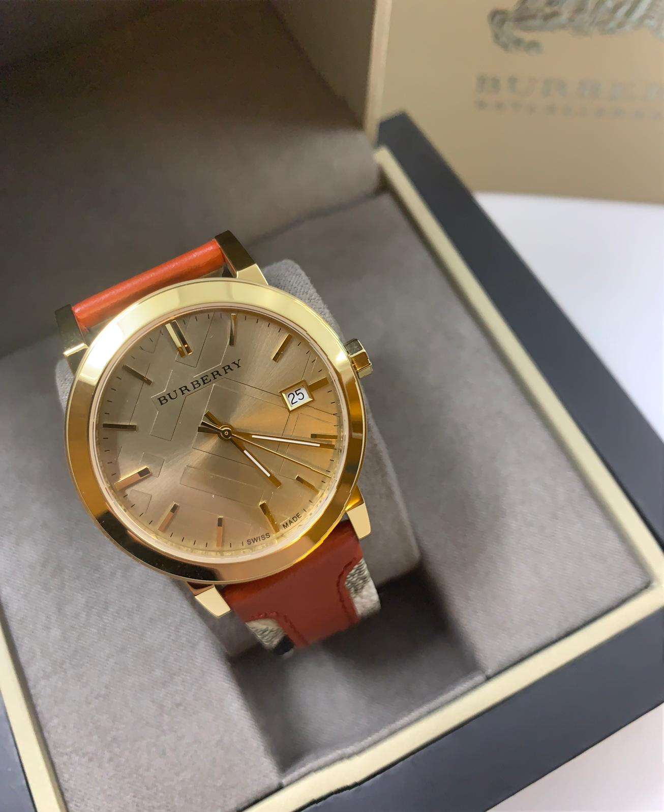  Shop Authentic Burberry The City Gold Dial Orange Leather Strap Watch for Women - BU9016 - Luxxuri