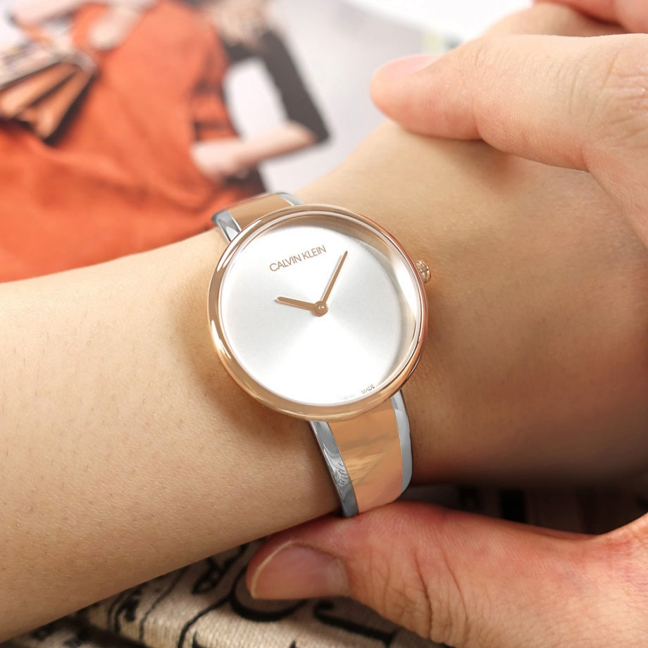  Shop Authentic Calvin Klein Seduce Silver Dial Two Tone Steel Strap Watch for Women - K4E2N61X - Luxxuri