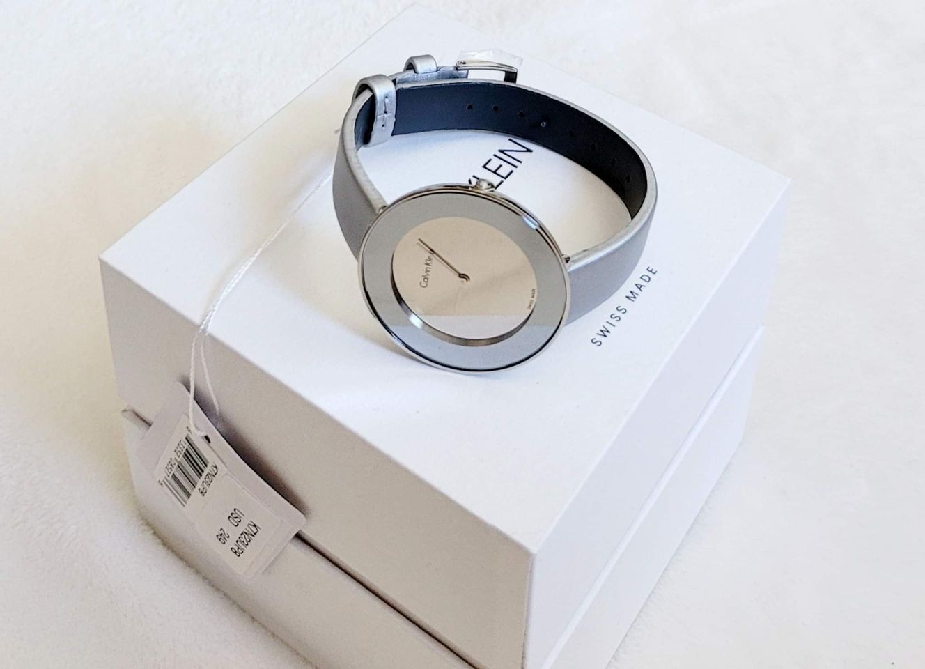  Shop Authentic Calvin Klein Chic Silver Dial White Leather Strap Watch for Women - K7N23UP8 - Luxxuri