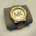  Shop Authentic Michael Kors Lennox Three-Hand Quartz Gold Dial Gold Steel Strap Watch For Men - MK8939 - Luxxuri
