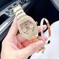 Guess Phoenix Multifunction Crystals Gold Dial Gold Steel Strap Watch For Men - GW0094G2