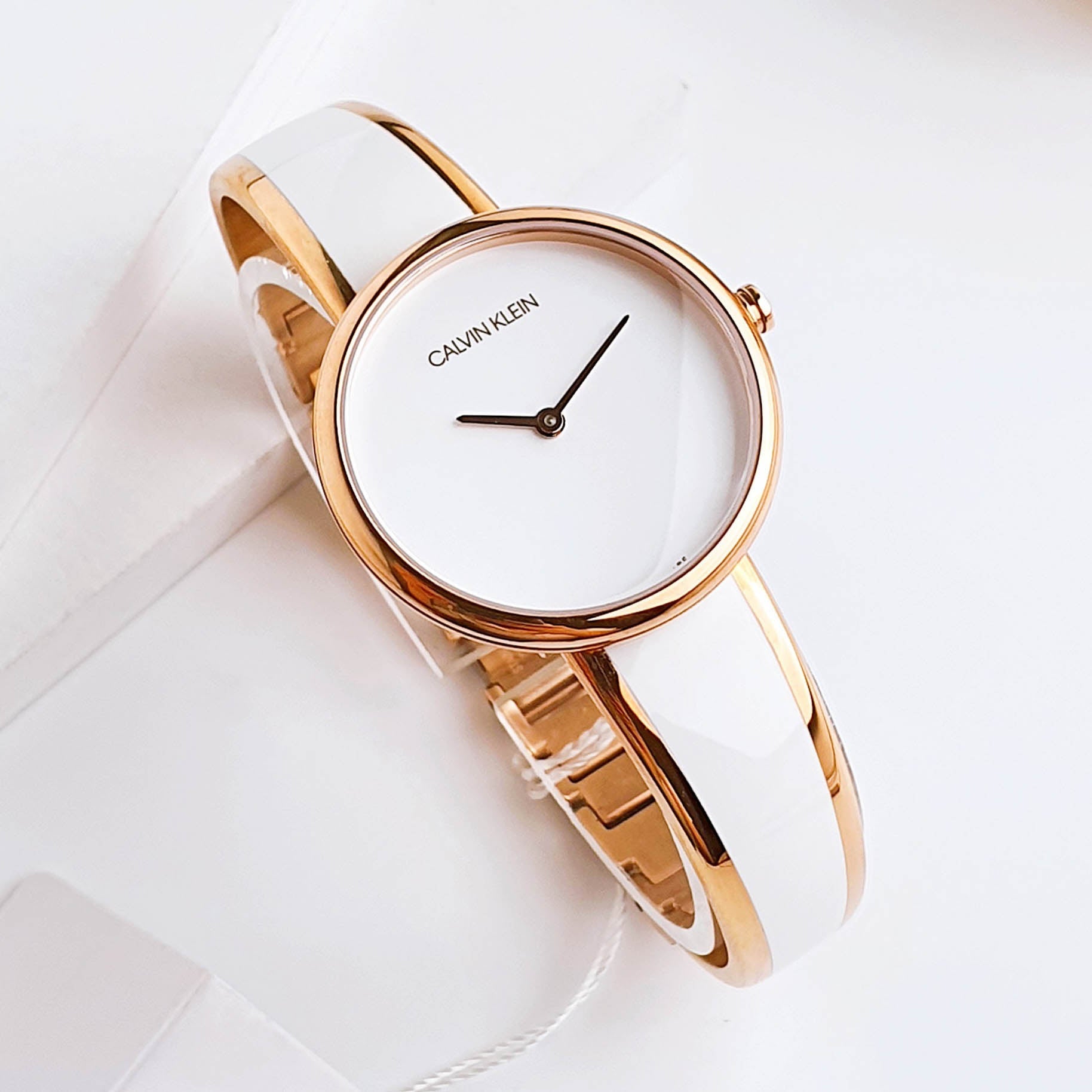  Shop Authentic Calvin Klein Seduce White Dial Two Tone Steel Strap Watch for Women - K4E2N616 - Luxxuri