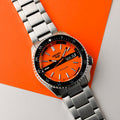  Shop Authentic Seiko 5 Sports Double Hurricane Retro Orange Dial Silver Steel Strap Watch For Men - SRPK11K1 - Luxxuri