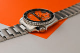  Shop Authentic Seiko 5 Sports Double Hurricane Retro Orange Dial Silver Steel Strap Watch For Men - SRPK11K1 - Luxxuri