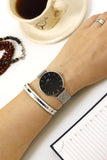  Shop Authentic Daniel Wellington Petite Sterling Black Dial Silver Mesh Bracelet Watch For Women - DW00100304 - Luxxuri