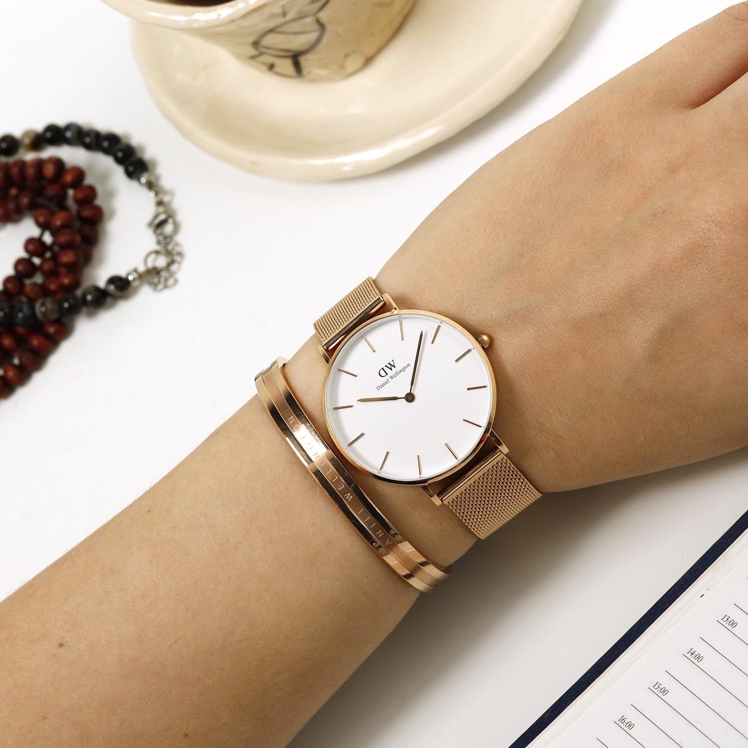  Shop Authentic Daniel Wellington Petite Melrose White Dial Rose Gold Mesh Strap Watch For Women - DW00100305 - Luxxuri