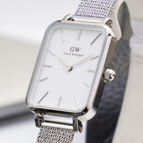  Shop Authentic Daniel Wellington Quadro Sterling White Dial Silver Mesh Strap Watch For Women - DW00100438 - Luxxuri