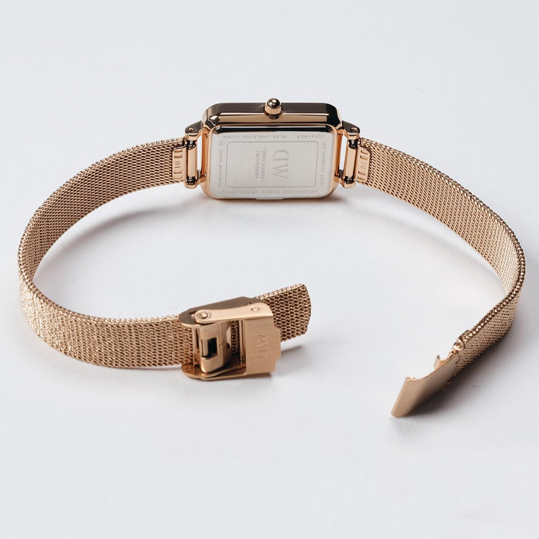  Shop Authentic Daniel Wellington Quadro Pressed Melrose Pink Dial Pink Mesh Bracelet Watch For Women - DW00100510 - Luxxuri