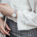  Shop Authentic Daniel Wellington Petite Sterling White Dial Silver Mesh Bracelet Watch For Women - DW00100164 - Luxxuri