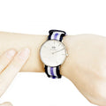  Shop Authentic Daniel Wellington Classic Trinity White Dial Three Tone Nylon Strap Watch For Women - 0609DW - Luxxuri