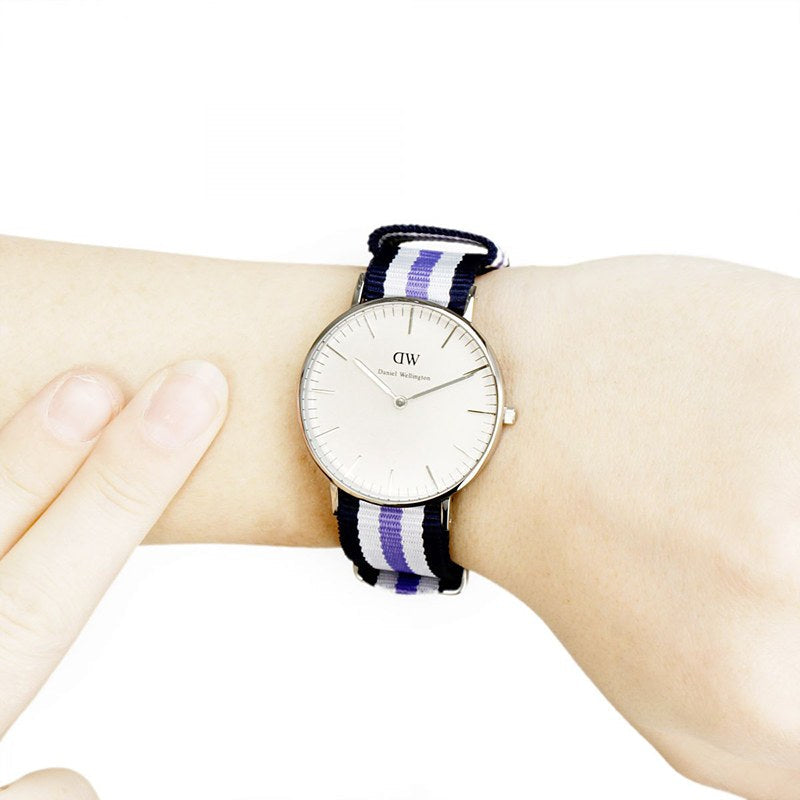  Shop Authentic Daniel Wellington Classic Trinity White Dial Three Tone Nylon Strap Watch For Women - 0609DW - Luxxuri