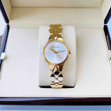  Shop Authentic Calvin Klein Snake Silver Dial Yellow Gold Steel Strap Watch For Women - K6E23546 - Luxxuri