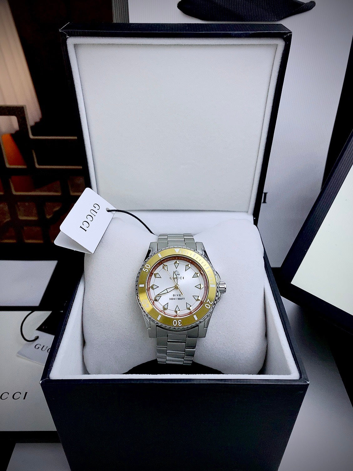  Shop Authentic Gucci Dive Automatic 18K Gold Silver Dial Silver Steel Strap Watch for Men - YA136357 - Luxxuri