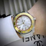  Shop Authentic Gucci Dive Automatic 18K Gold Silver Dial Silver Steel Strap Watch for Men - YA136357 - Luxxuri