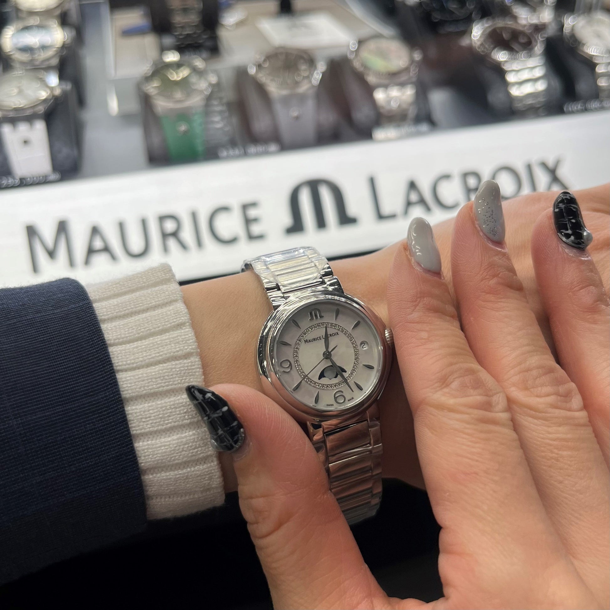  Shop Authentic Maurice Lacroix Fiaba Moonphase White Mother of Pearl Dial Silver Steel Strap Watch for Women - FA1084-SS002-170-1 - Luxxuri
