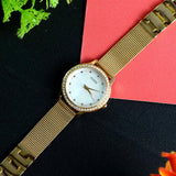  Shop Authentic Guess Chelsea Crystals Mother of Pearl White Dial Gold Mesh Bracelet Watch For Women - W0647L7 - Luxxuri
