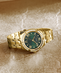  Shop Authentic Guess Cosmo Diamonds Green Dial Gold Steel Strap Watch for Women - GW0033L8 - Luxxuri