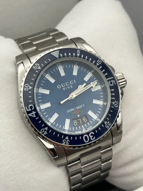  Shop Authentic Gucci Dive Quartz Blue Dial Silver Steel Strap Watch For Men - YA136311 - Luxxuri
