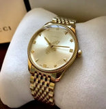  Shop Authentic Gucci G Timeless Quartz Silver Dial Gold Steel Strap Watch For Women - YA1264155 - Luxxuri