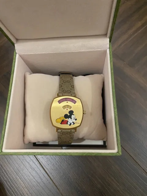  Shop Authentic Gucci Grip Disney Mickey Mouse Gold Dial Brown Leather Strap Watch For Women - YA157420 - Luxxuri