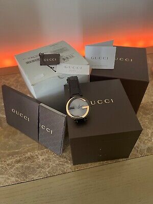  Shop Authentic Gucci Interlocking G 18K Gold Black Dial Brown Leather Strap Watch For Women - YA133304 - Luxxuri