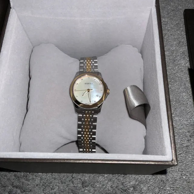  Shop Authentic Gucci G Timeless Diamonds Mother of Pearl Dial Two Tone Mesh Bracelet Watch For Women - YA126514 - Luxxuri