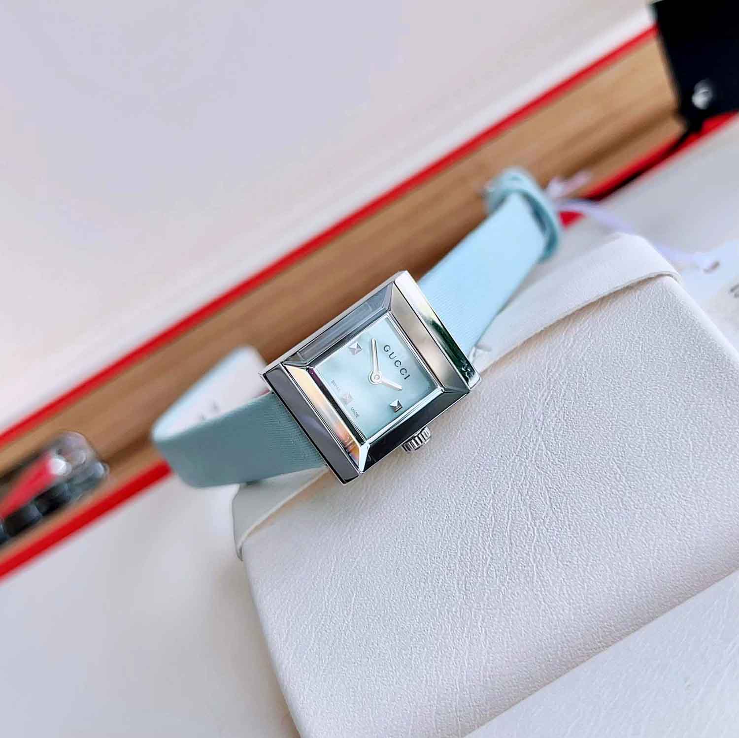  Shop Authentic Gucci G-Frame Pastel Blue Mother of Pearl Dial Blue Leather Strap Watch For Women - YA128531 - Luxxuri