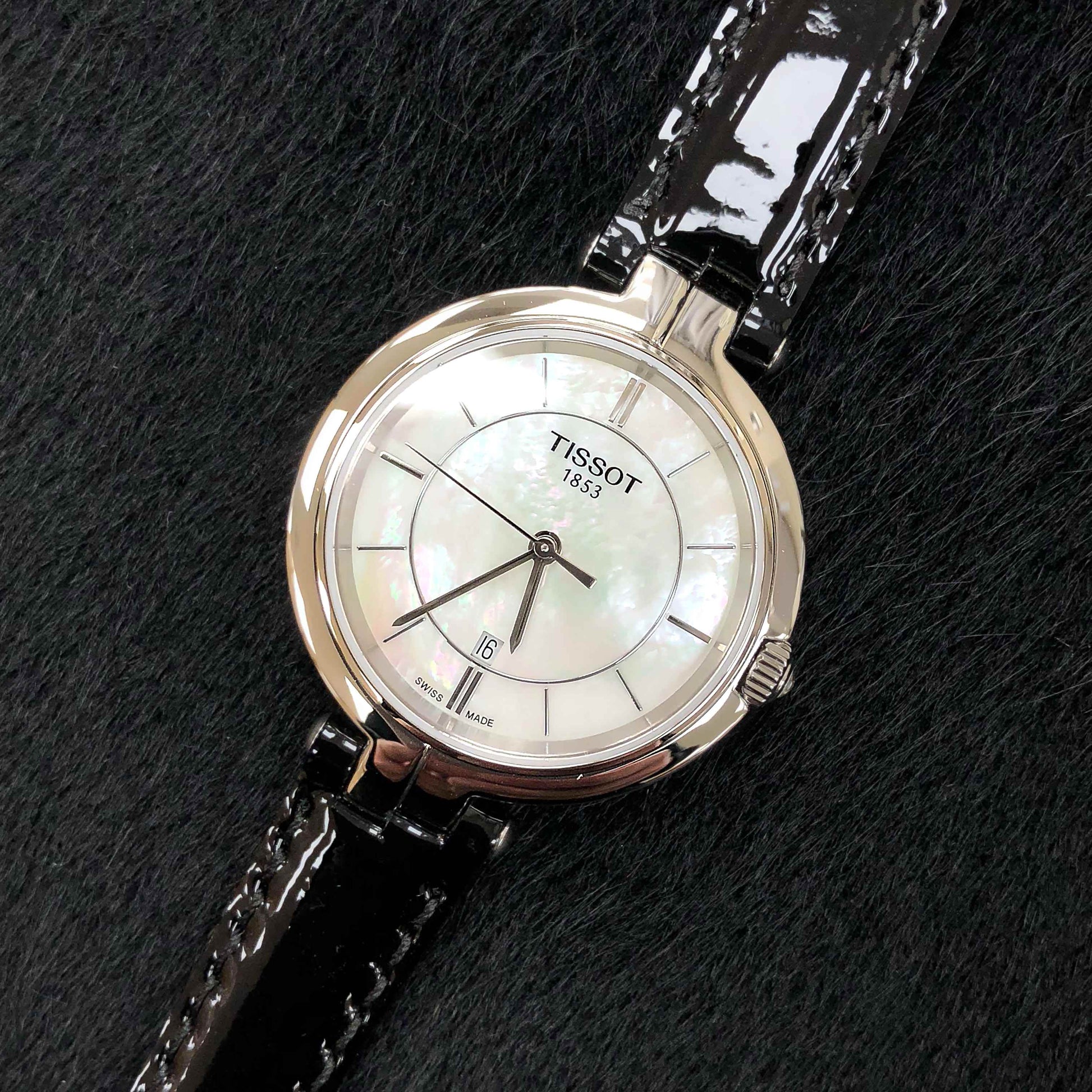  Shop Authentic Tissot T Lady Flamingo Mother of Pearl White Dial Black Leather Strap Watch for Women - T094.210.16.111.00 - Luxxuri