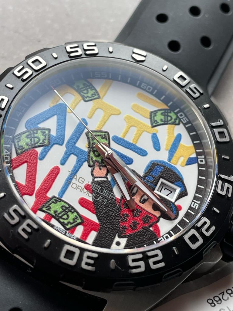  Shop Authentic Tag Heuer Formula 1 Alec Monopoly White Dial Watch for Men - WAZ1119.FT8023 - Luxxuri