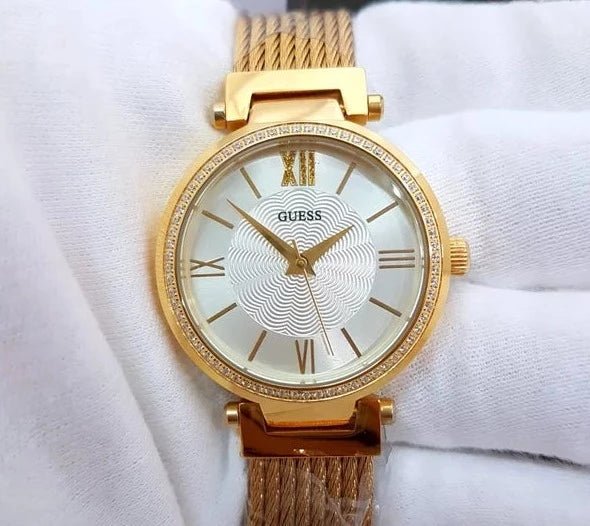  Shop Authentic Guess Soho Champagne Dial Stainless Steel Mesh Bracelet Watch For Women - W0638L2 - Luxxuri