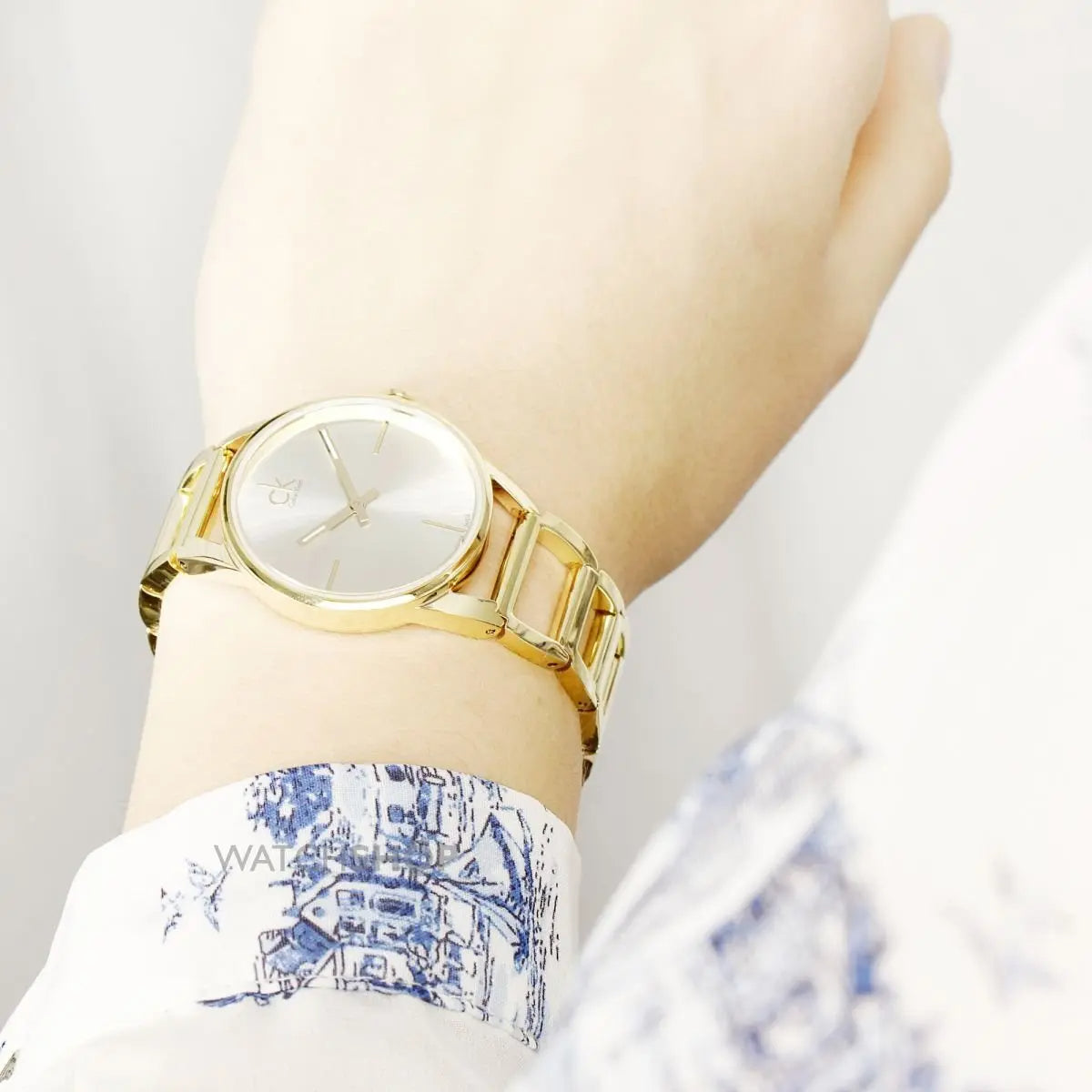  Shop Authentic Calvin Klein Stately Silver Dial Gold Steel Strap Watch for Women - K3G23526 - Luxxuri