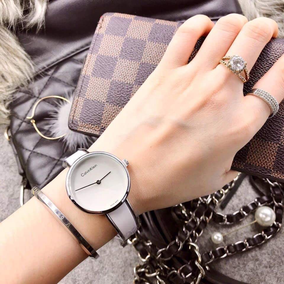  Shop Authentic Calvin Klein Seduce White Dial Two Tone Steel Strap Watch for Women - K4E2N116 - Luxxuri