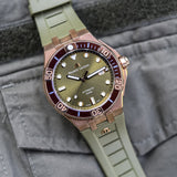  Shop Authentic Maurice Lacroix Aikon Venturer Bronze Dial Green Rubber Strap Watch For Men - AI6058-BRZ01-630-1 - Luxxuri