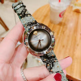  Shop Authentic Versace Shadov Quartz Silver Dial Snakeskin Green Leather Strap Watch for Women - VEBM00718 - Luxxuri