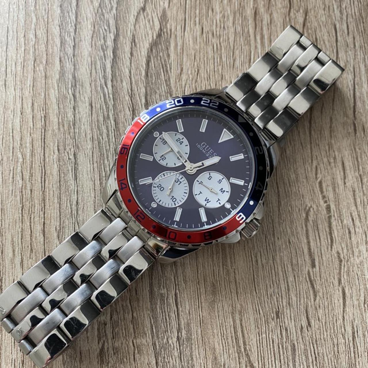  Shop Authentic Guess Odyssey Multifunction Blue Dial Silver Steel Strap Watch For Men - W1107G2 - Luxxuri