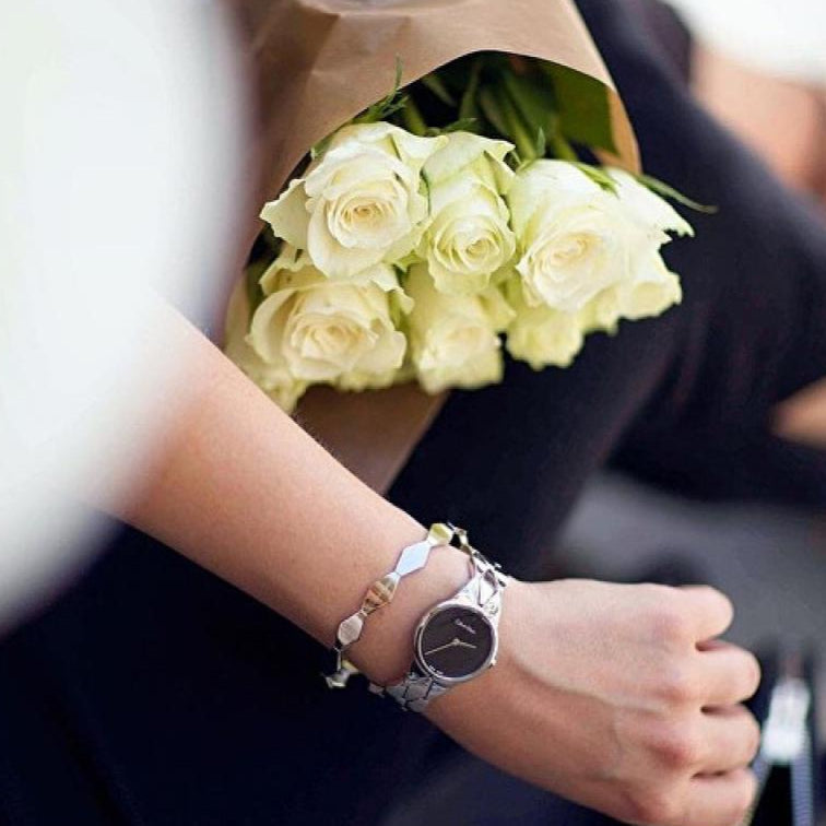  Shop Authentic Calvin Klein Snake Black Dial Silver Steel Strap Watch For Women - K6E23141 - Luxxuri