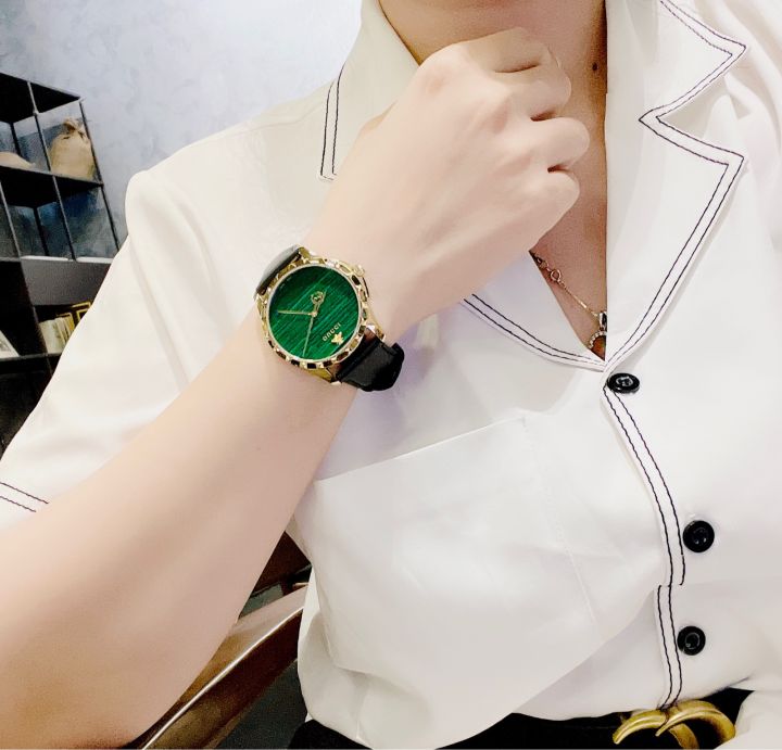  Shop Authentic Gucci Le Marche Des Merveilles Quartz Green Dial Black Leather Strap Watch For Women - YA126463 - Luxxuri