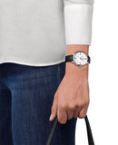  Shop Authentic Tissot Bella Ora Round White Dial Black Leather Strap Watch For Women - T103.210.16.018.00 - Luxxuri