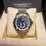 Shop Authentic Tag Heuer Formula 1 Calibre 6 Automatic Blue Dial Silver Steel Strap Watch for Men - WAZ2014.BA0842 - Luxxuri