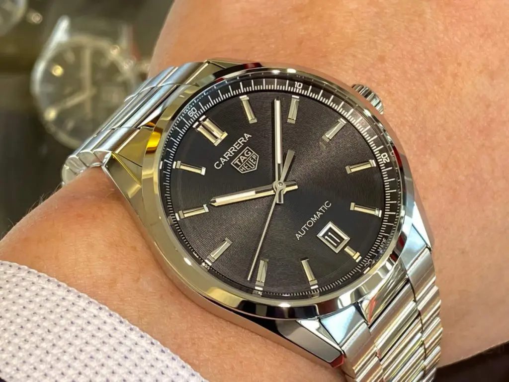  Shop Authentic Tag Heuer Carrera Date Black Dial Silver Steel Strap Watch for Men - WBN2110.BA0639 - Luxxuri