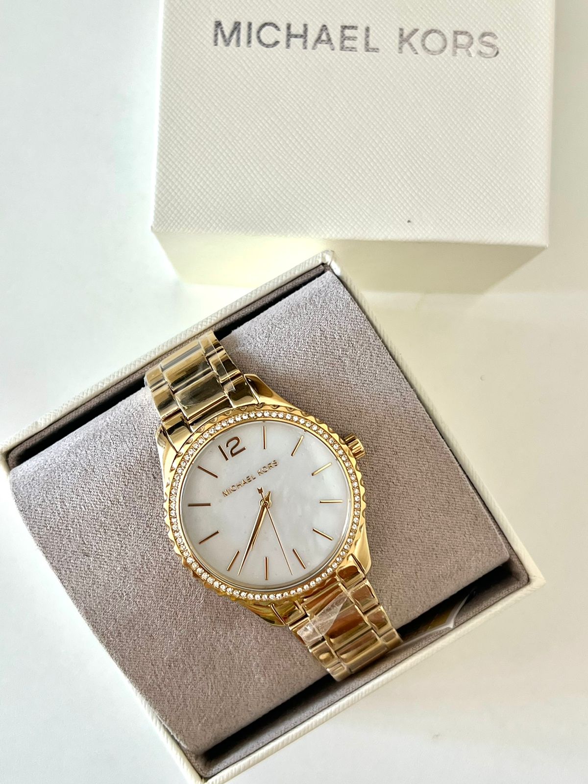  Shop Authentic Michael Kors Layton Three Hand Mother of Pearl White Dial Gold Steel Strap Watch For Women - MK6870 - Luxxuri