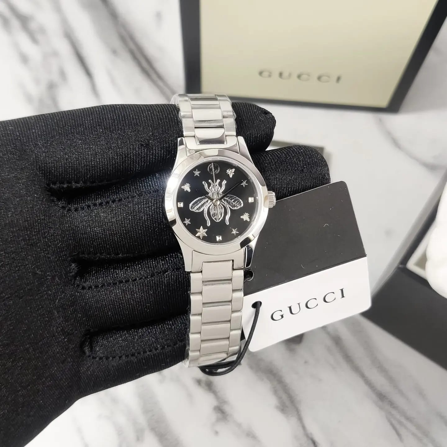  Shop Authentic Gucci G Timeless Quartz Diamonds Black Dial Silver Steel Strap Watch For Women - YA1265024 - Luxxuri