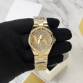  Shop Authentic Michael Kors Lennox Three Hand Gold Dial Gold Steel Strap Watch For Women - MK7229 - Luxxuri